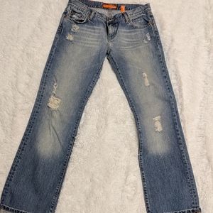 Straight leg slightly distressed medium wash jeans